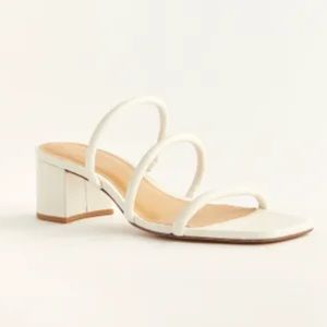 Brand new. NWT reformation heeled white heeled sandals. Size 7